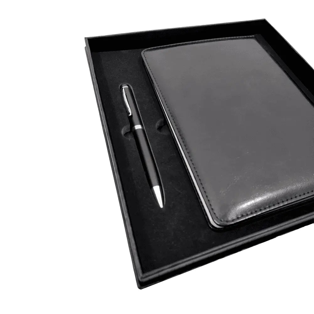 Angled view of premium notebook and pen gift set in black box, suitable for corporate and executive gifts.