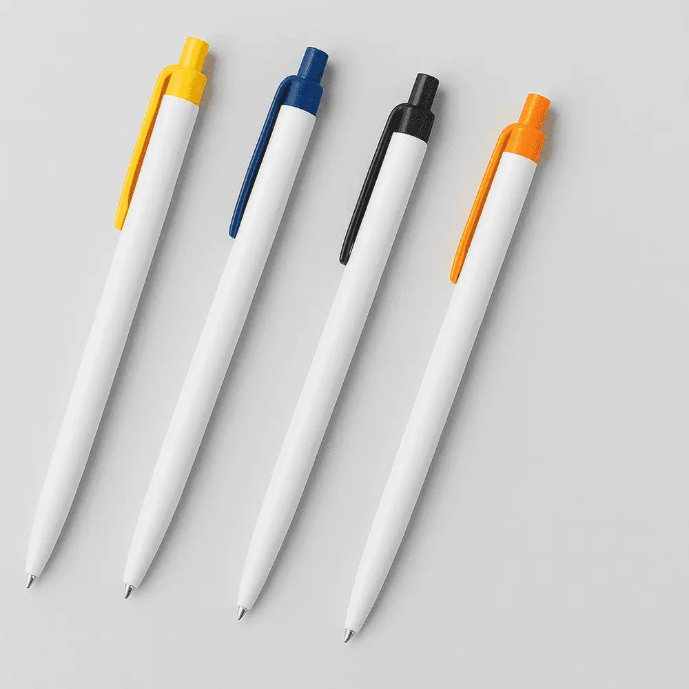 Set of four promotional plastic pens in yellow, blue, black, and orange clip colors, perfect for customizable branding and event giveaways.