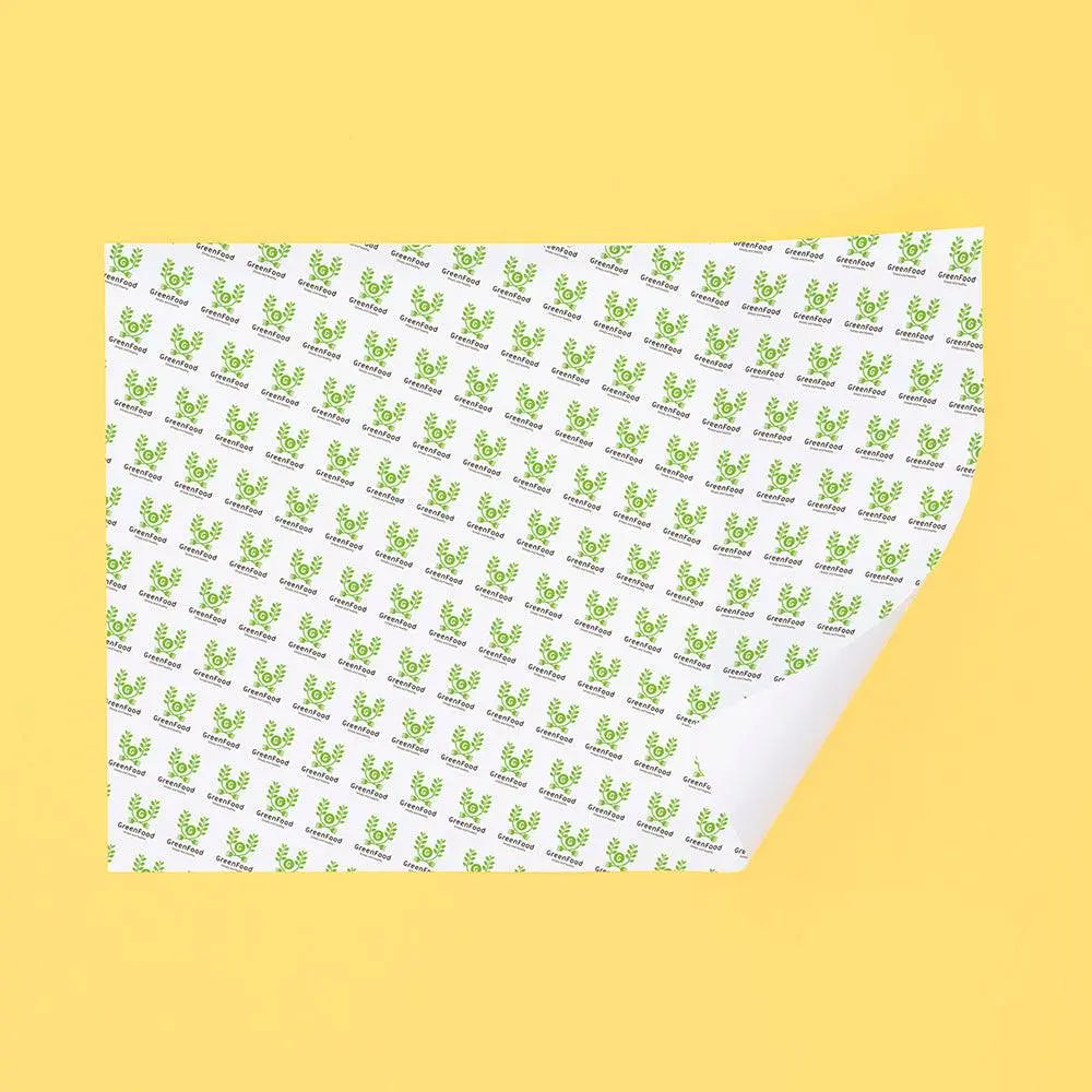 Eco-friendly sandwich paper with green food-themed icons, designed for safe and sustainable food packaging in the take-out industry.
