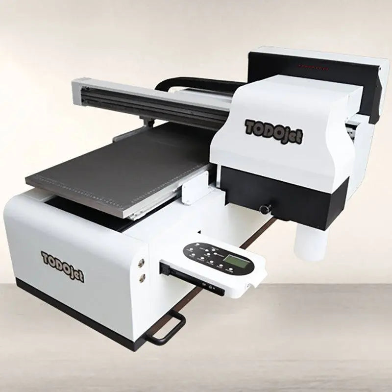 Close-up of TODOjet UV 3050 A3 Digital UV Flatbed Printer showing control panel and print bed for high-quality surface printing applications.
