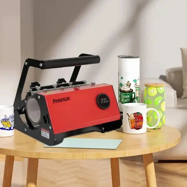 Heat Transfer Mug Printing Machine on a table surrounded by custom-printed mugs and tumblers, showcasing its use in personalized drinkware creation.
