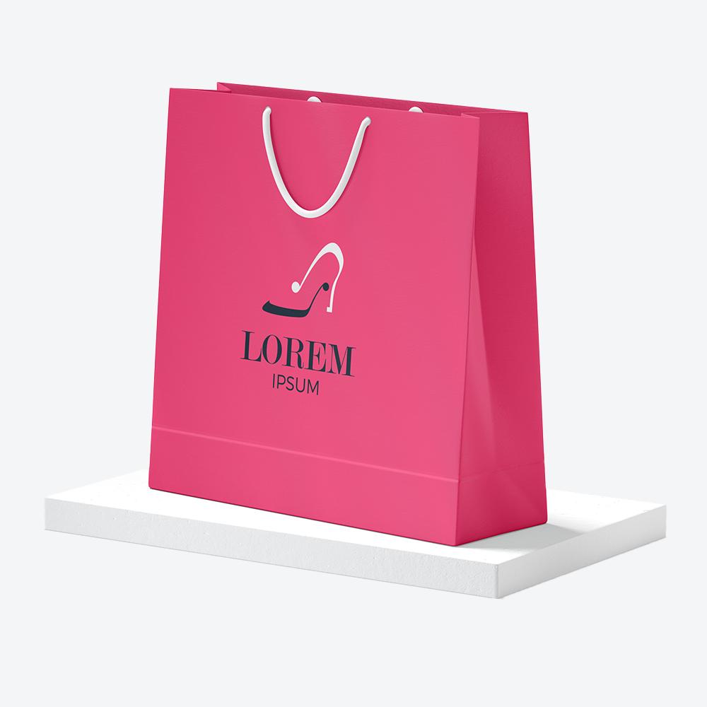 Premium pink shopping bag with elegant design and logo, representing the Premium Bags collection at Printava.