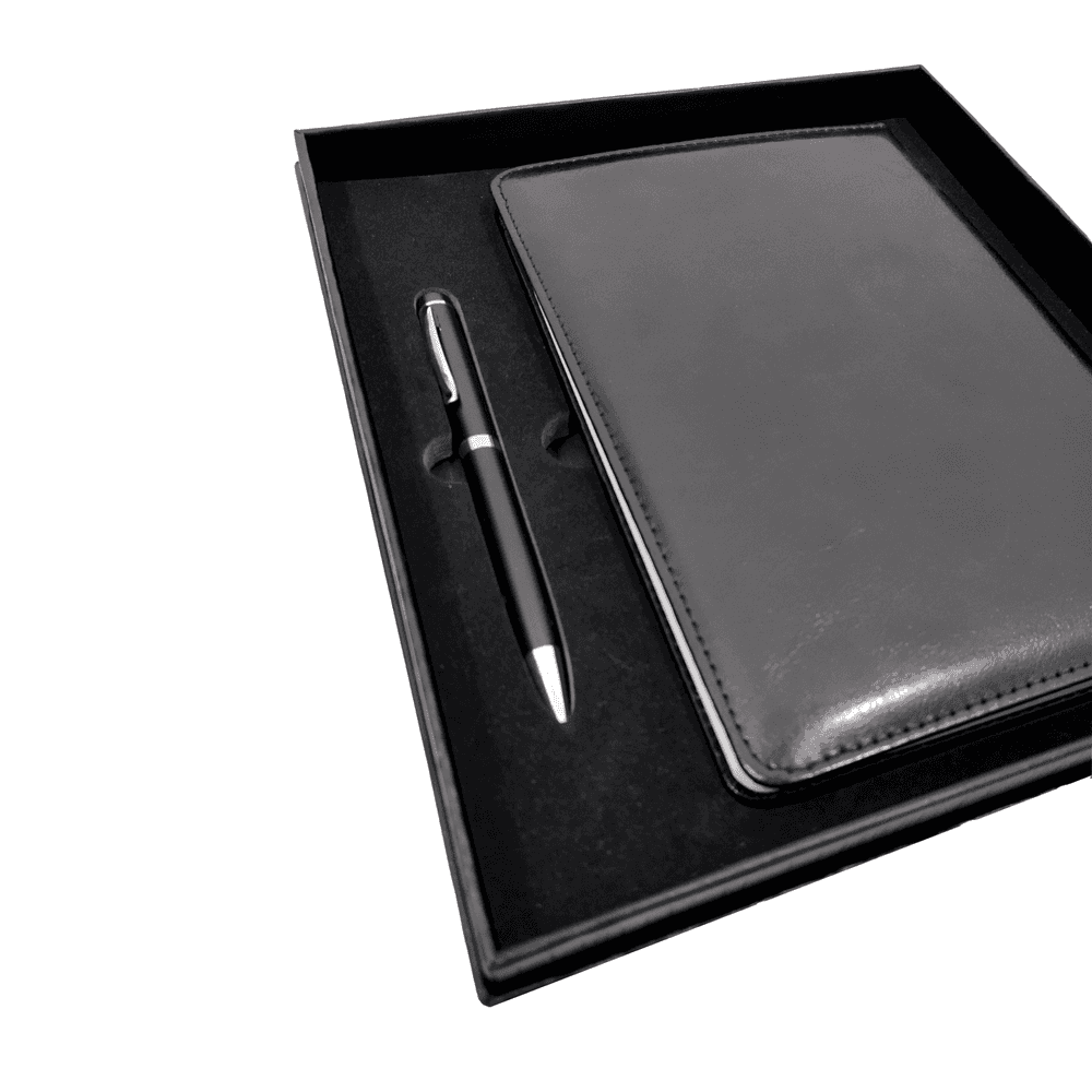 Angled view of premium notebook and pen gift set in black box, suitable for corporate and executive gifts.