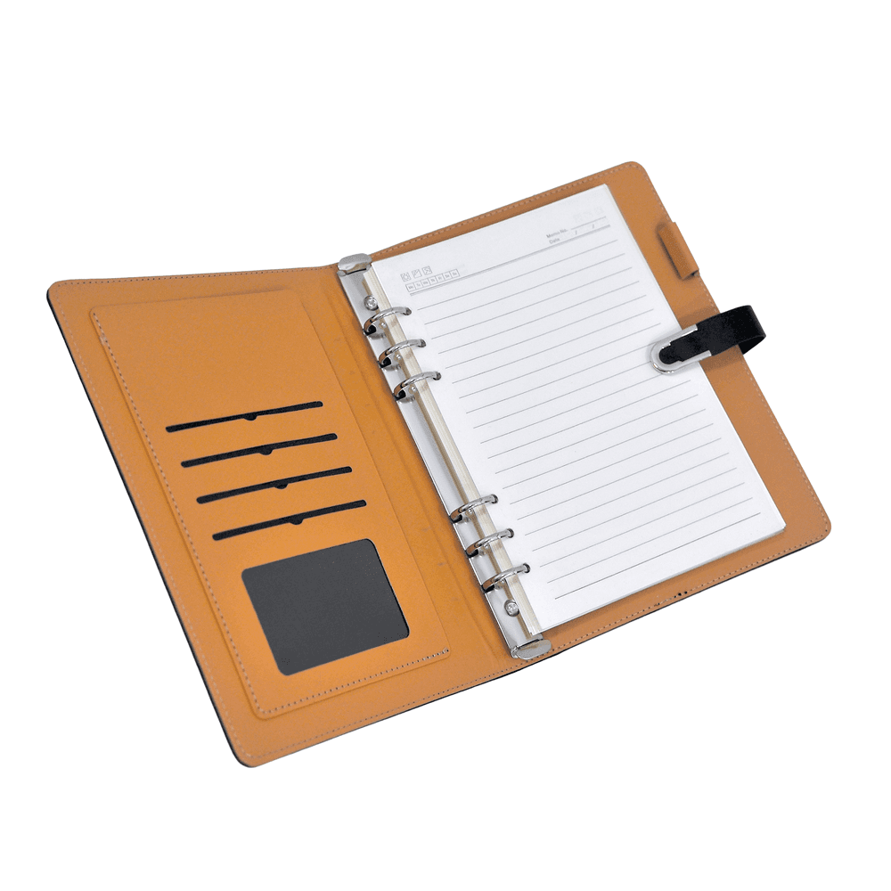 Inside view of leatherette notebook with refillable pages, card slots, and pen holder, part of the corporate gift set.