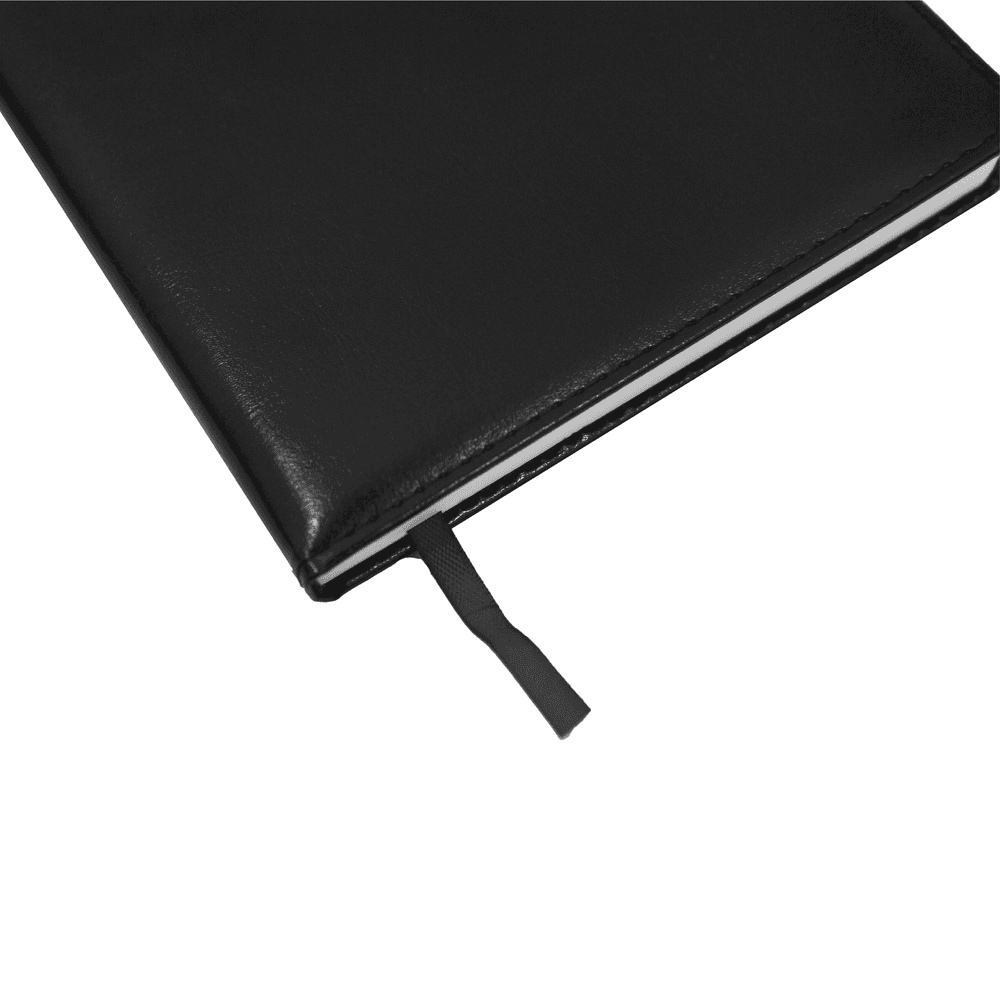 Close-up of black notebook corner with ribbon bookmark, part of the Corporate Gift Set for office professionals.