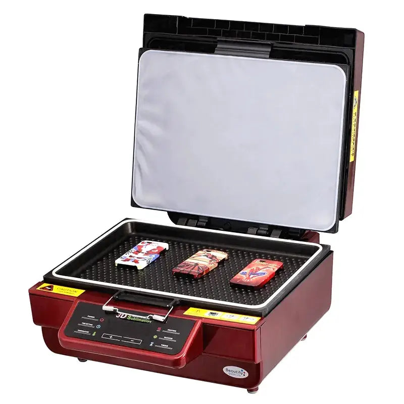 Open ST-3042 3D Sublimation Vacuum Heat Press Machine showing phone cases placed inside for heat transfer printing.