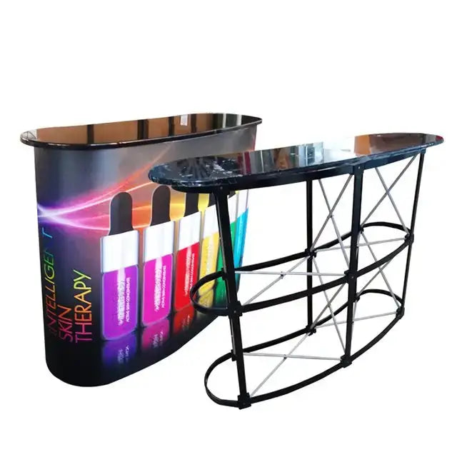Pop Up Foldable Counter with colorful printed wrap and exposed frame. Ideal for showcasing products at trade shows and promotional events.