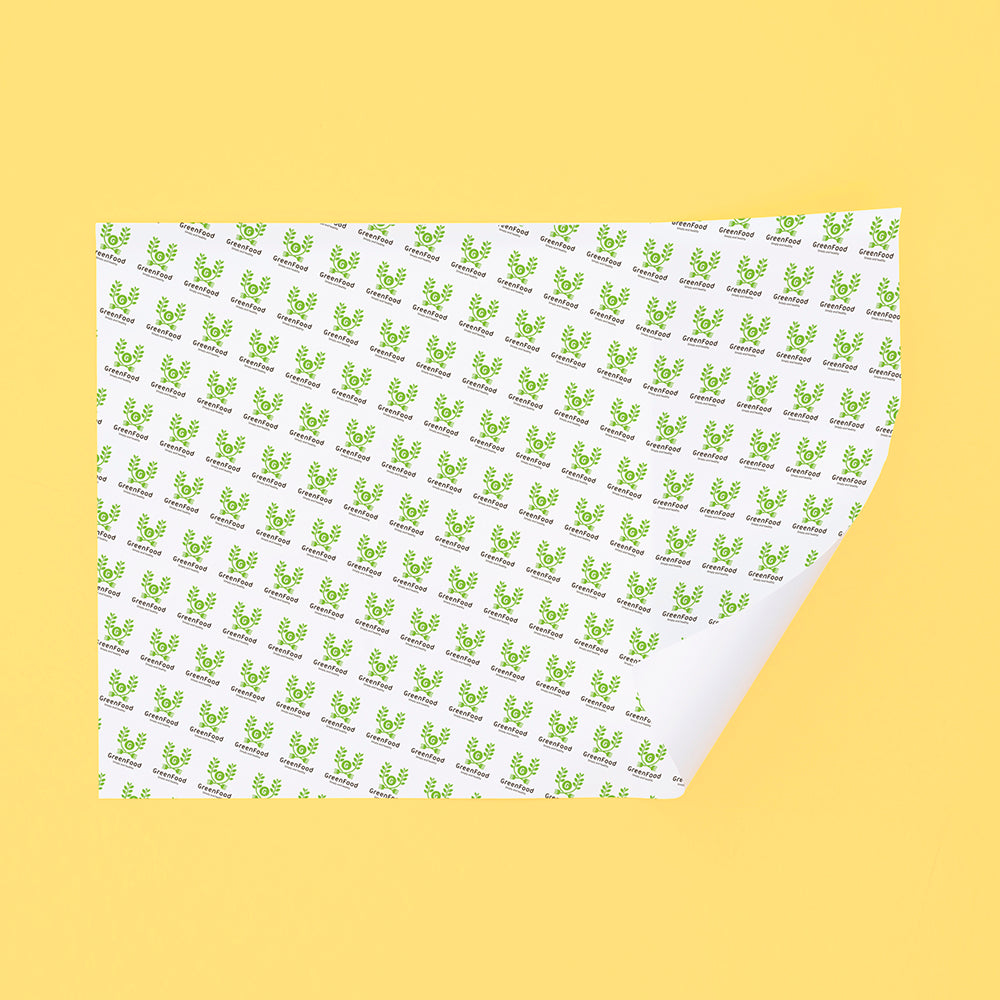 Green logo patterned sandwich paper on yellow