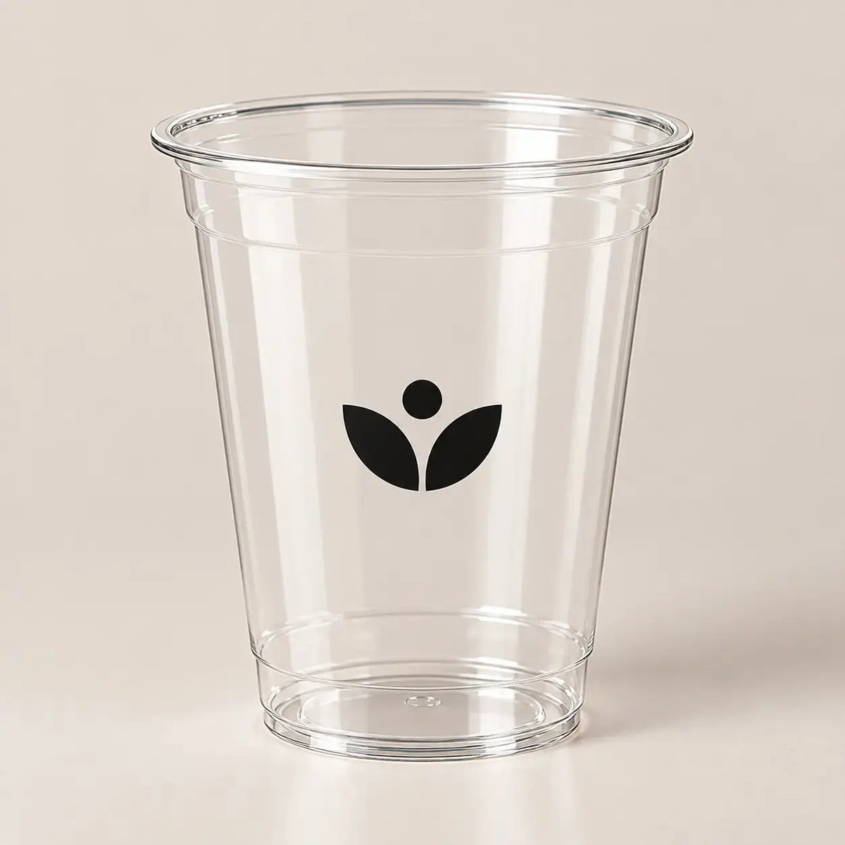 Clear plastic cup with a black single-color logo | كوب بلاستيكي شفاف بشعار أسود بلون واحد