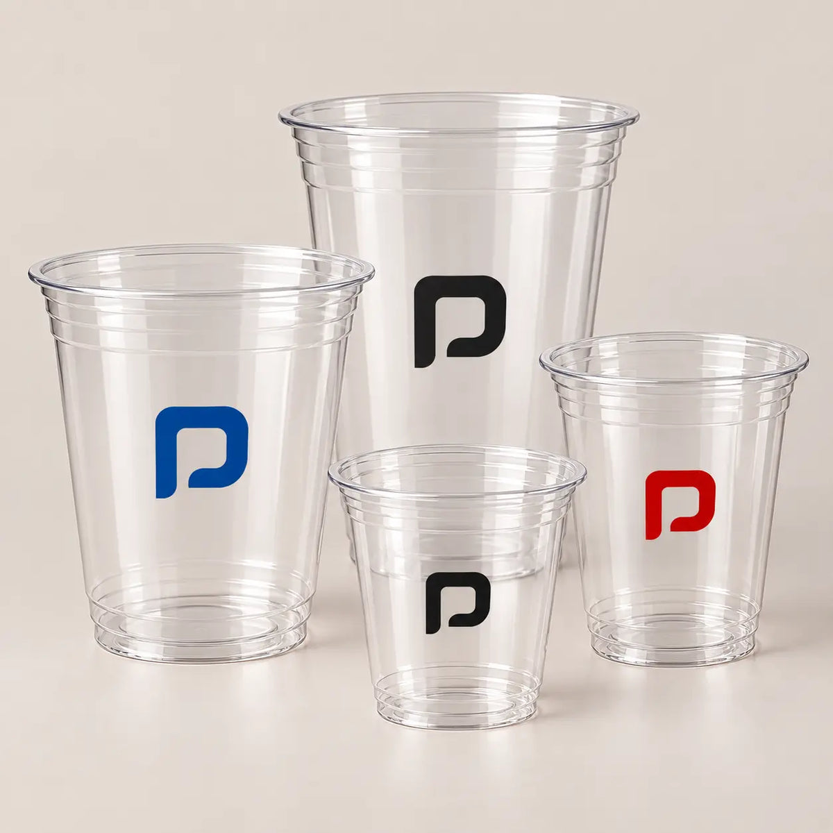 Clear plastic cups with single-color custom logos | أكواب بلاستيكية شفافة بشعارات بلون واحد