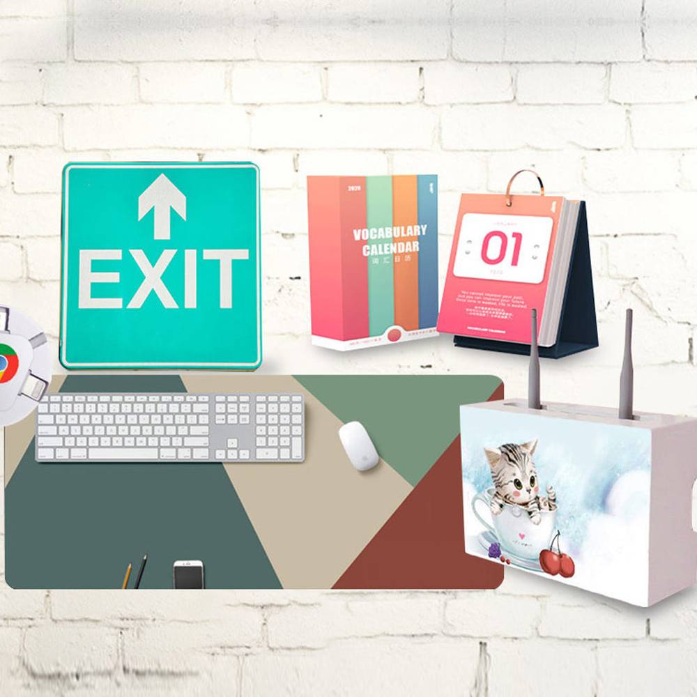 Printed samples using TODOjet UV 3050 Digital UV Flatbed Printer including signs, calendars, and custom mouse pads, demonstrating versatility.