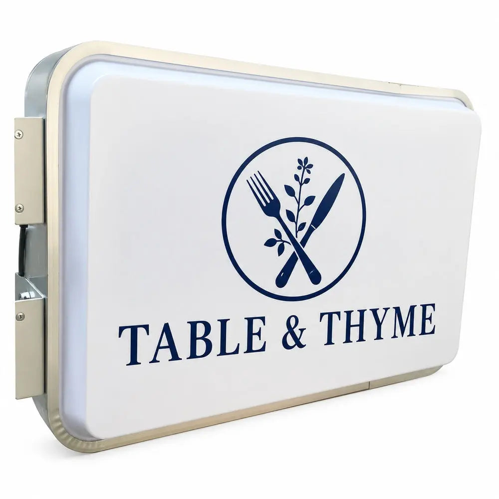 Restaurant logo on rectangular light box angled view